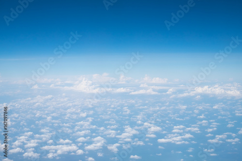 The clouds and the sky are vast