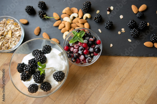 Healthy breakfast with fresh berries and almonds