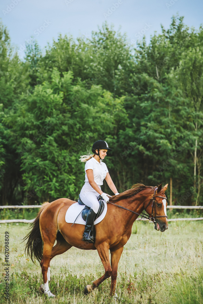 Girl jockey riding a horse