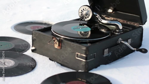 Old gramophone record Playing in the snow