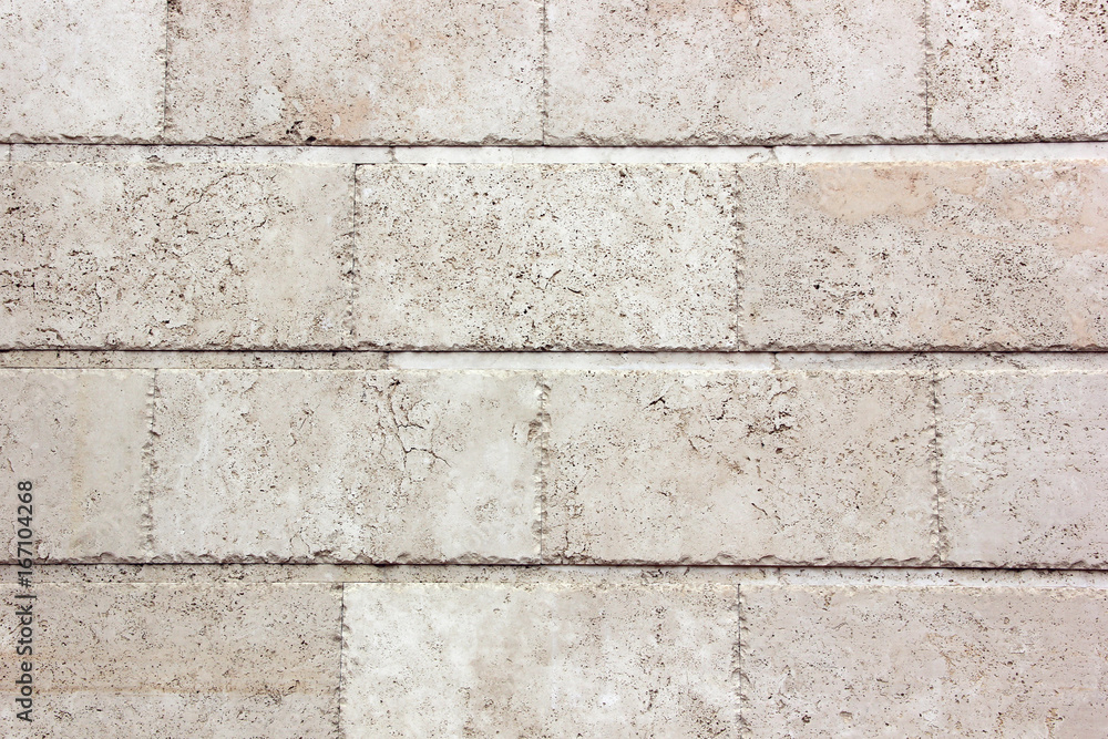 White wall of large blocks. The texture of the stone. White wall of large blocks. The texture of the stone.