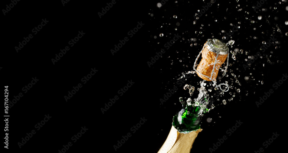 Opening bottle of champagne on empty black background - obrazy, fototapety, plakaty 