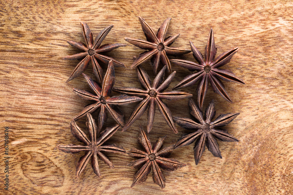 Star anise on wooden background Star anise on wooden background