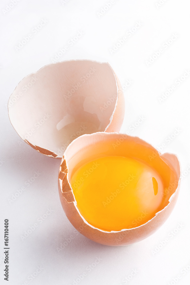 Eggs isolated on white background. Cracked egg shell with yolk