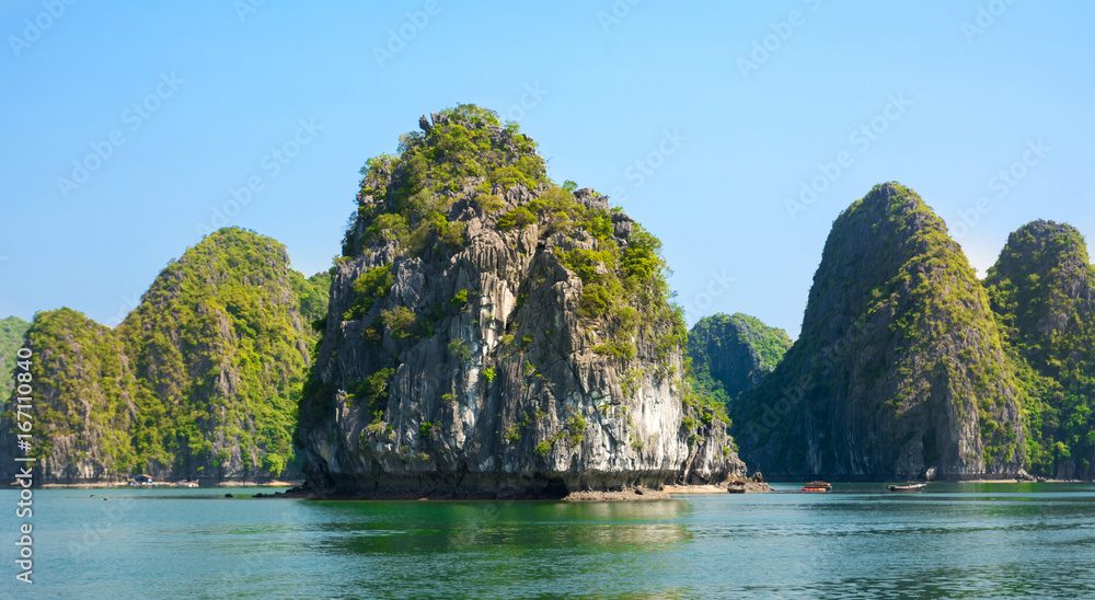Limestone rocks and blue sea of Halong bay, Vietnam