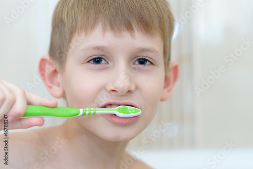 Teen with a toothbrush