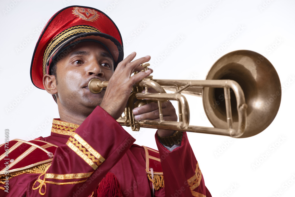 Bandmaster playing on a trumpet Stock Photo | Adobe Stock