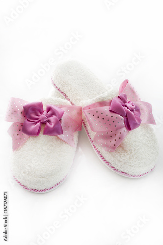Fototapeta Naklejka Na Ścianę i Meble -  Pair of blank white home slippers. Bed shoes accessory footwear