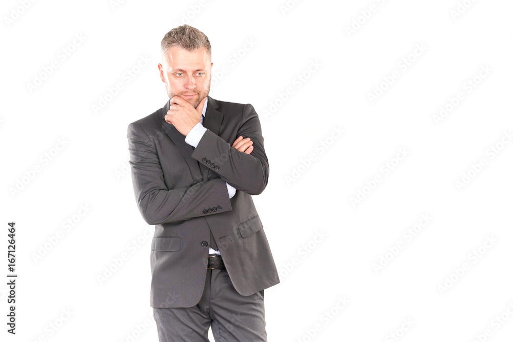 Portrait of middle-aged businessman in elegant suit posing against white background Portrait of middle-aged businessman in elegant suit posing against white background
