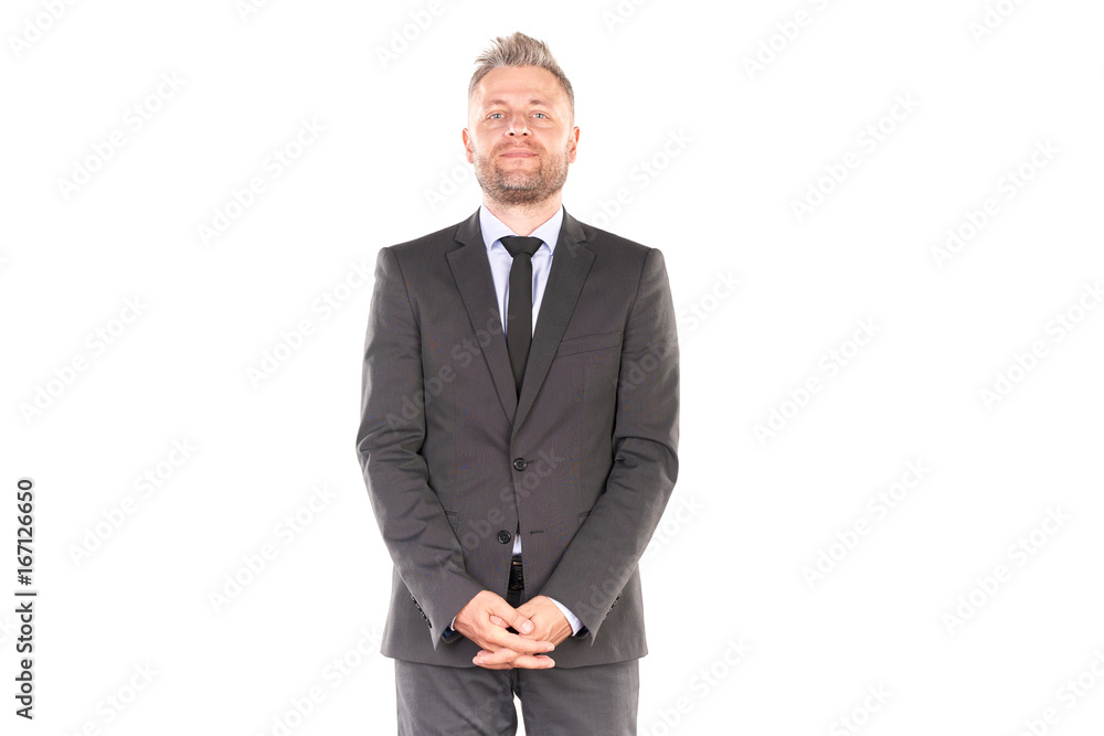 Portrait of middle-aged businessman in elegant suit posing against white background Portrait of middle-aged businessman in elegant suit posing against white background