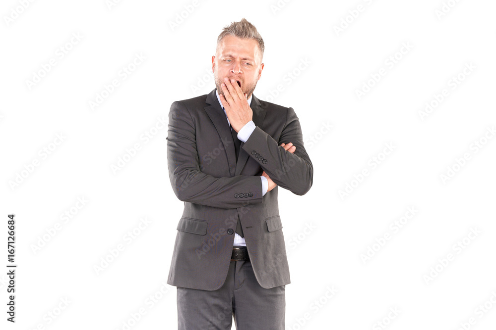 Portrait of middle-aged businessman in elegant suit posing against white background Portrait of middle-aged businessman in elegant suit posing against white background