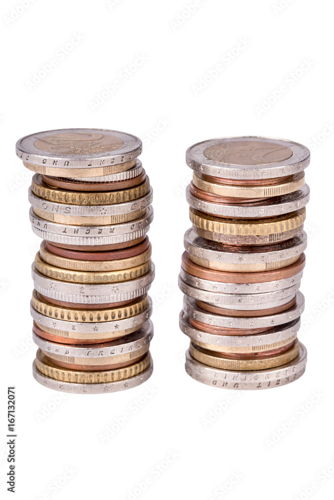 Two piles of euro coins isolated on white background Two piles of euro coins isolated on white background