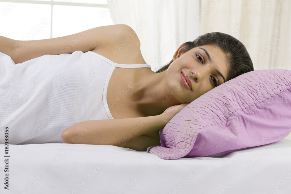 Young girl lying in bed Young girl lying in bed