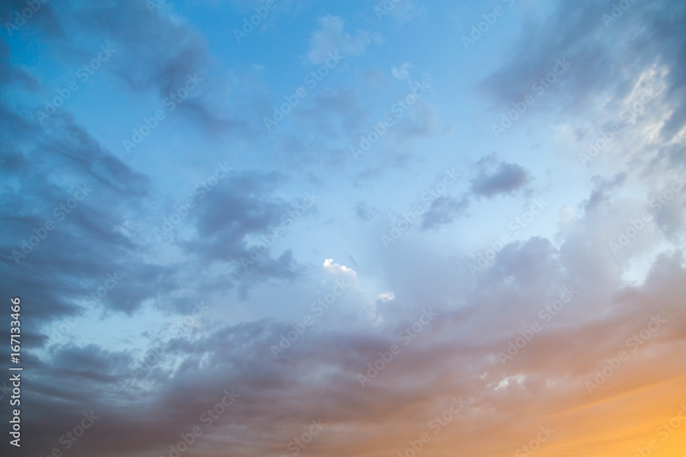 Fototapeta premium Clouds at sunset as background
