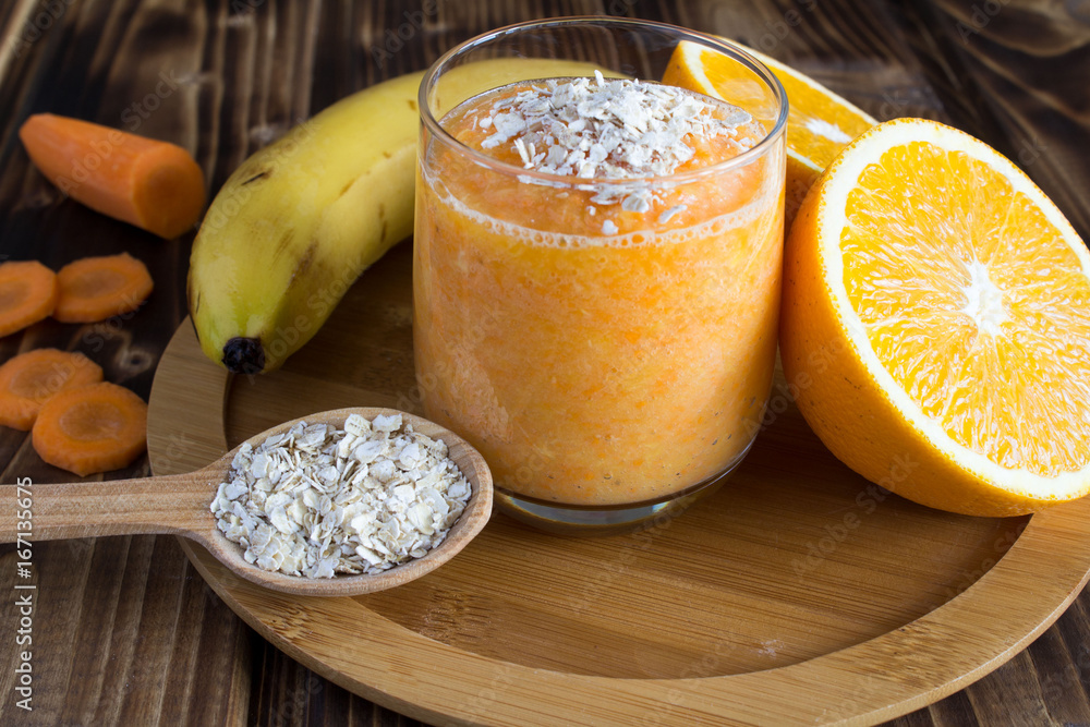 Smoothie and oat flakes on the cutting board Smoothie and oat flakes on the cutting board