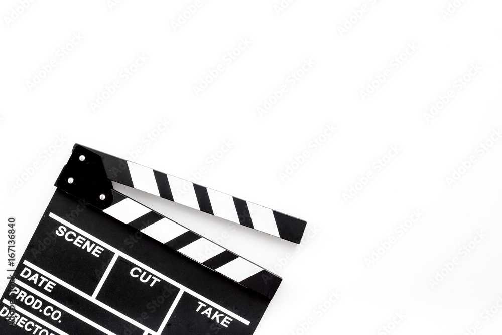 Filmmaker profession. Clapperboard on white background top view copyspace