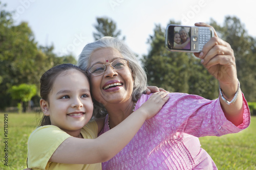 Grandmother and granddaughter taking a self portrait