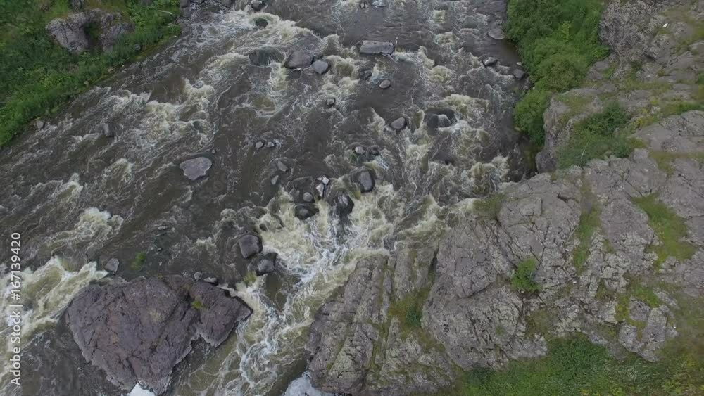 From above shot of rocks on riverside From above shot of rocks on riverside