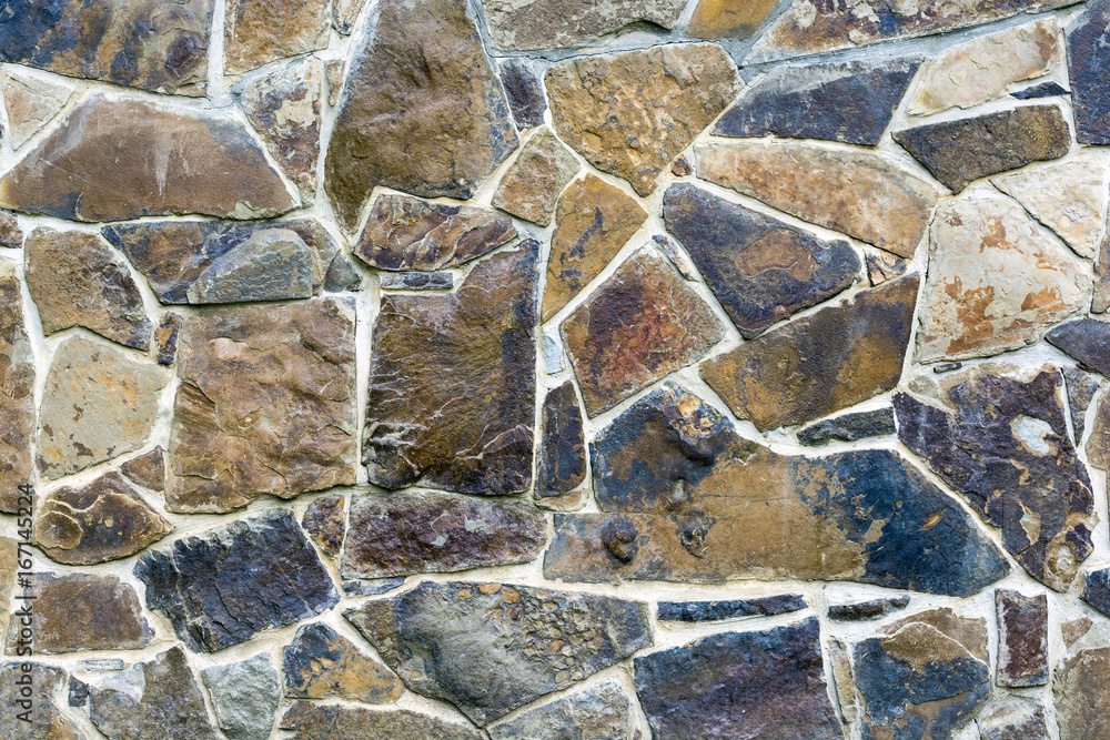 Fototapeta premium Rock wall brickwork brown texture background