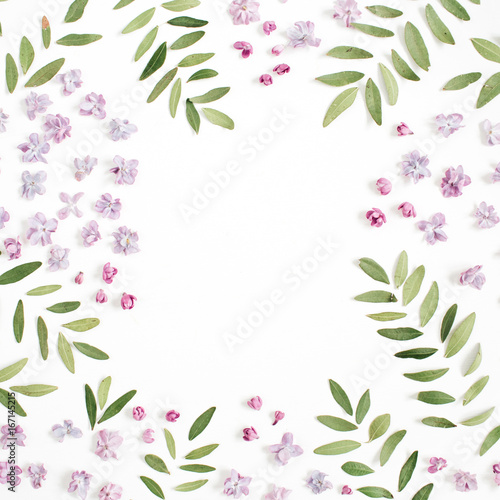 Frame of lilac flower petals, green leaves with space for text on white background. Flat lay, top view