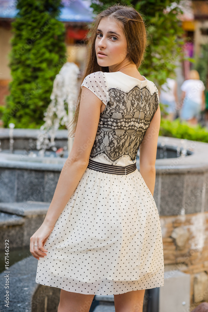 Portrait of beautiful young woman wearing in a dress Portrait of beautiful young woman wearing in a dress