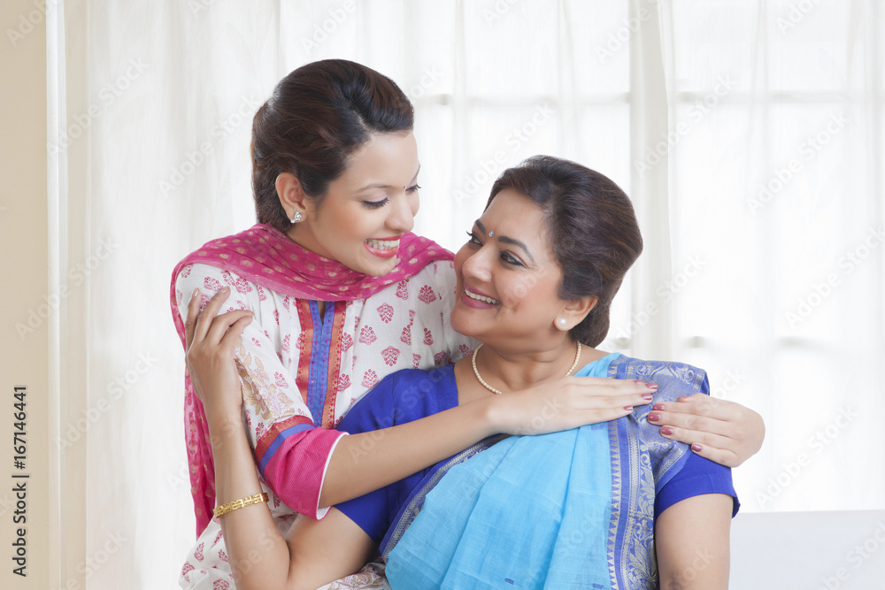 Mother and daughter smiling Mother and daughter smiling