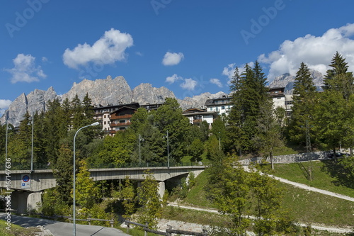 Autumnal corso Italia, the beautiful stone bridge in Cortina D'Ampezzo near Dolomite mountains, Dolomite, Alps, Veneto, Italy, Europe 