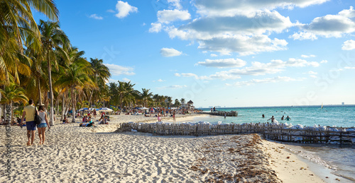 Fototapeta Naklejka Na Ścianę i Meble -  Isla Mujeres Beach Mexico / Peaceful North Beach with palm trees