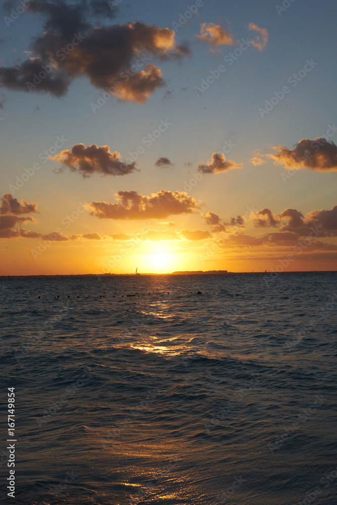 Colorful sky at Beach / Romantic sunset on Isla Mujeres in Mexico Colorful sky at Beach / Romantic sunset on Isla Mujeres in Mexico