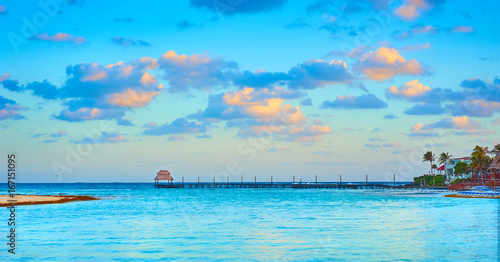 Fototapeta Naklejka Na Ścianę i Meble -  Exotic Beach, Paradise - Travel, Tourism and Vacations Concept. Landscape of Tropical Resort. Jetty near Cancun, Mexico
