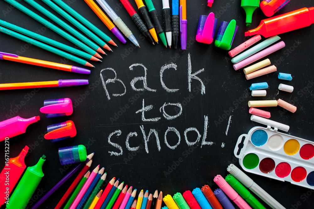 Back to school concept.School and office supplies on black background. Flat lay with copy space Back to school concept.School and office supplies on black background. Flat lay with copy space