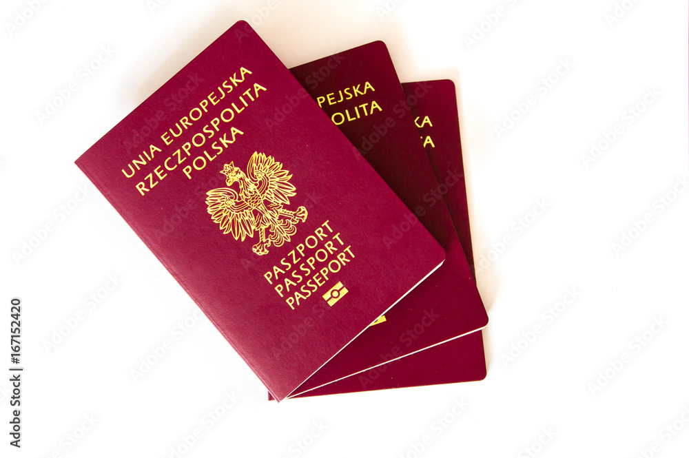 Three Polish biometric passports on white background. Three Polish biometric passports on white background.