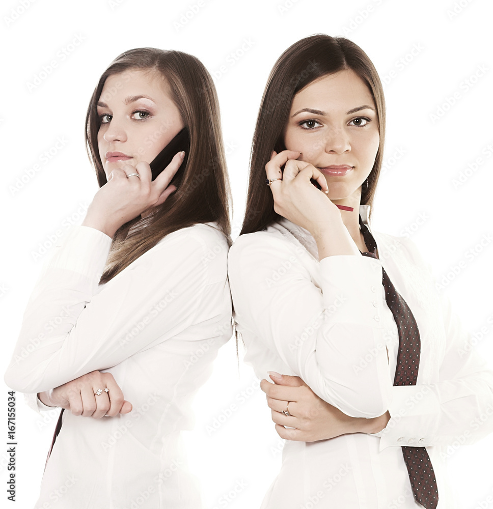 Two business women isolated on white background Two business women isolated on white background