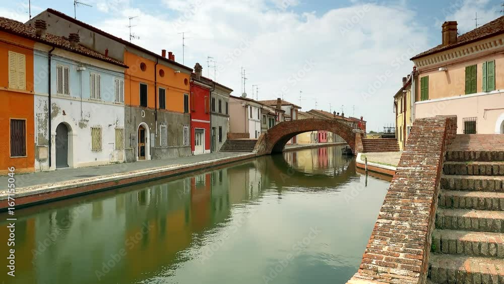 timelapse shot of ancient bridge of Comacchio, lagoon village near Ferrara, color graded clip timelapse shot of ancient bridge of Comacchio, lagoon village near Ferrara, color graded clip