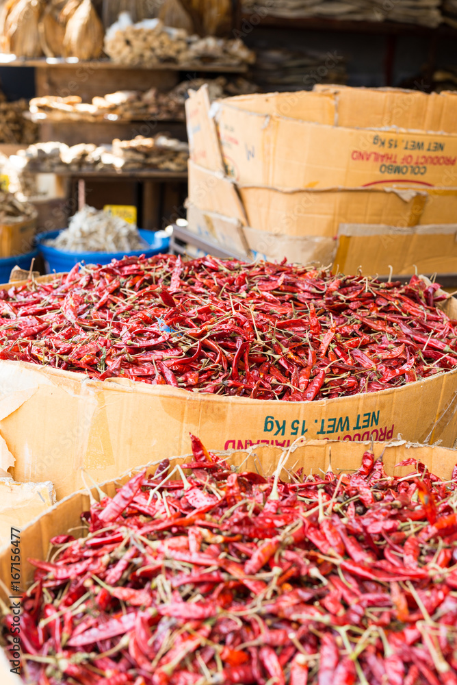 Plenty of dried, red hot chili pepper in a cardboard box in a store in Galle, Sri Lanka. Many shops in the major city offers all kind of herb and spice from south Asia.