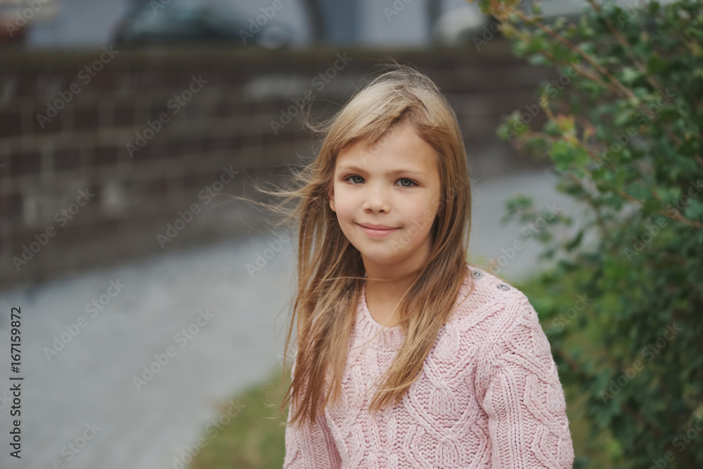 beautiful young girl posing on the street beautiful young girl posing on the street
