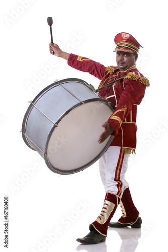 Portrait of a bandmaster playing the drums