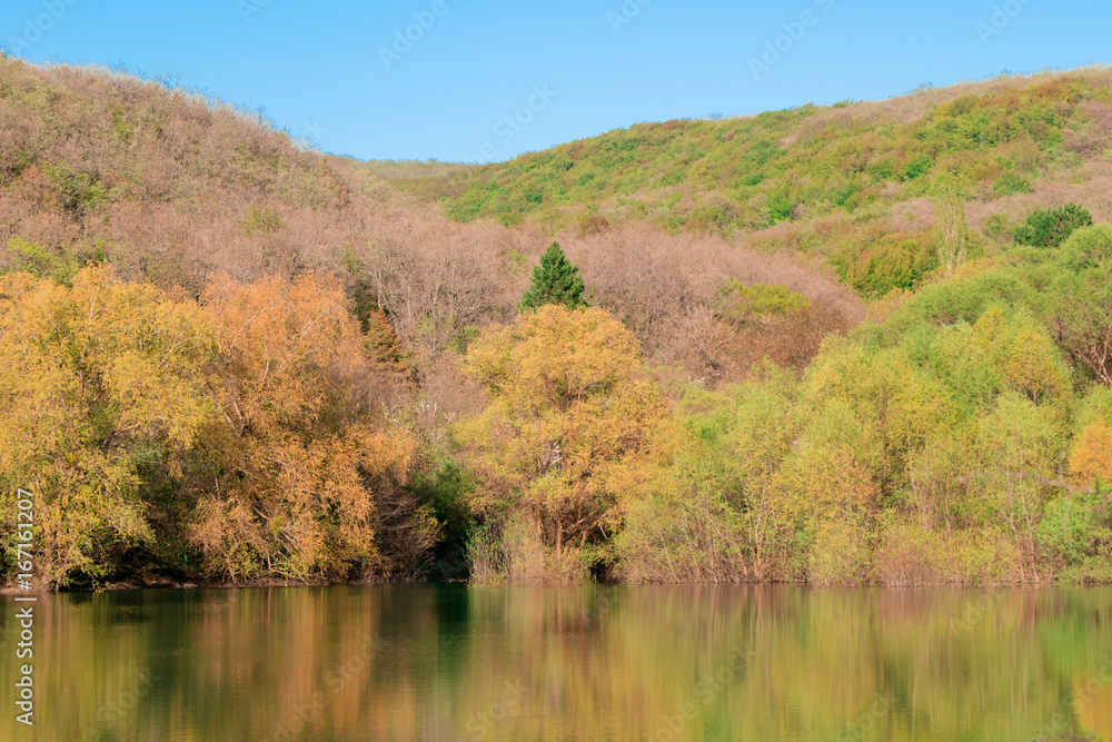 Autumn nature of the Crimea is a beautiful. Mountain lake in autumn, Sevastopol. Autumn nature of the Crimea is a beautiful. Mountain lake in autumn, Sevastopol.