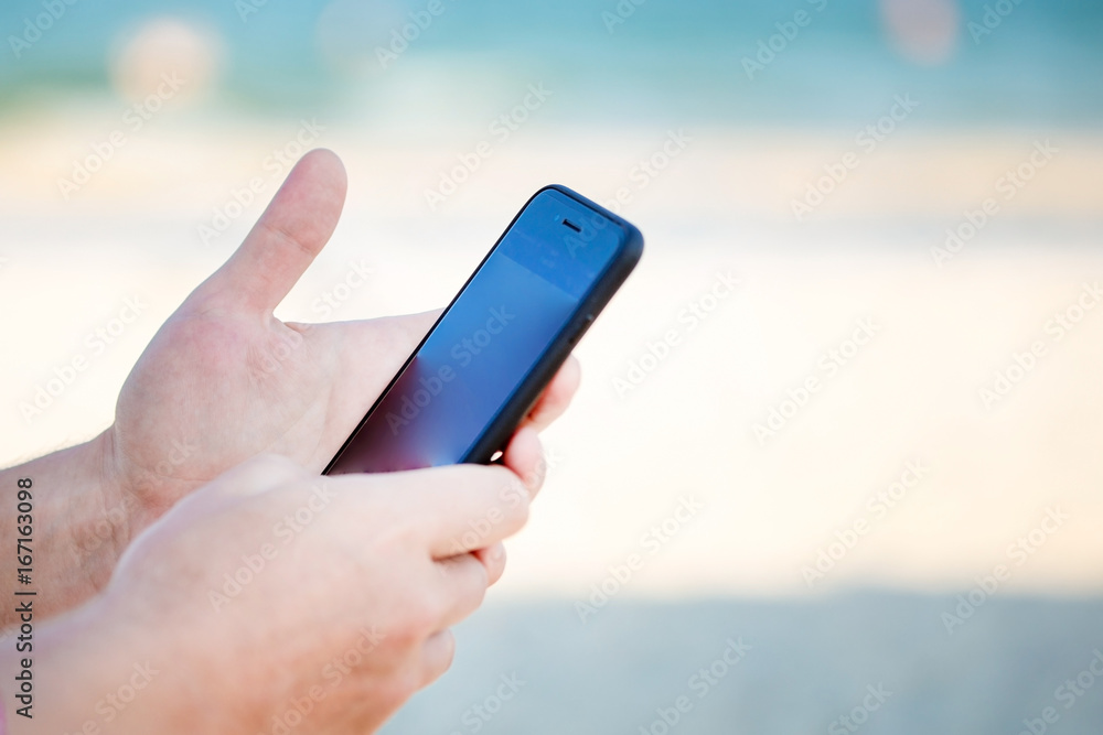 Close up photo man holding a smart mobile