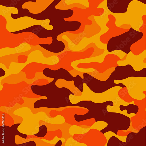 Camouflage pattern background. Classic clothing style masking camo repeat print. Fire orange brown yellow colors forest texture. Design element. Vector illustration.