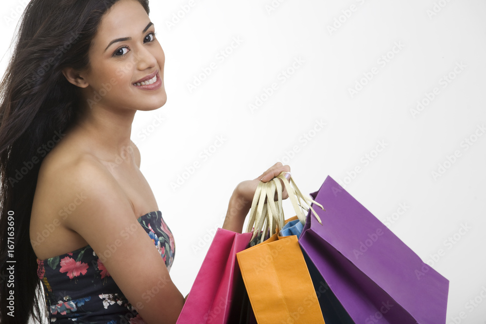 Girl holding shopping bags Girl holding shopping bags