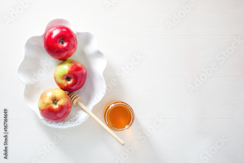 Fotografie Apples, pomegranate and honey for Rosh Hashanah
