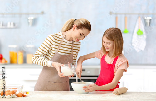 Happy mother and daughter c...