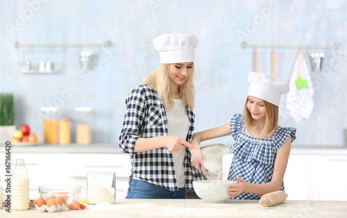 Happy mother and daughter c...