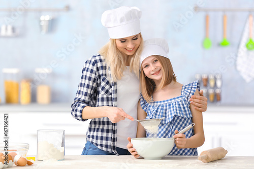 Happy mother and daughter c...