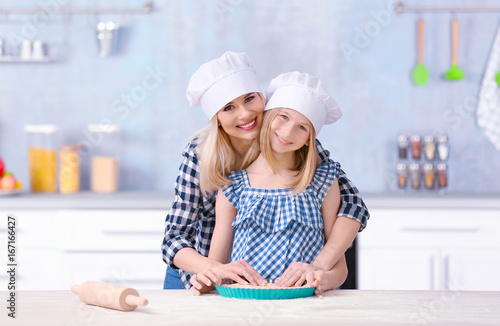 Mother and daughter cooking...
