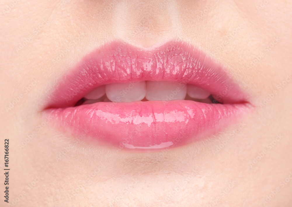 Obraz premium Lips of beautiful young woman, closeup