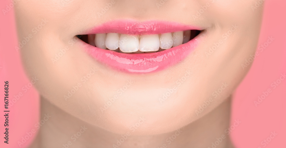 Fototapeta premium Lips of beautiful young woman, closeup