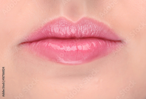 Lips of beautiful young woman, closeup