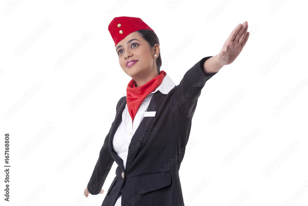 Thoughtful young air hostess with arms outstretched isolated over white background Thoughtful young air hostess with arms outstretched isolated over white background